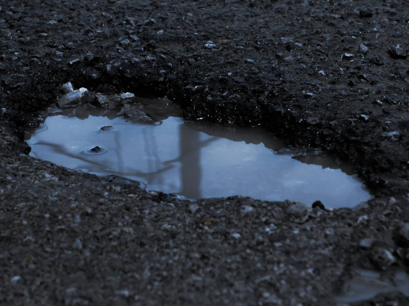 Pothole repair on a commercial parking lot